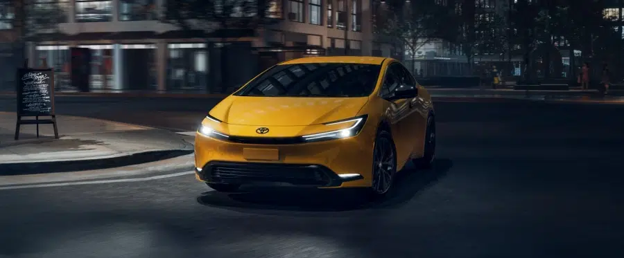 Toyota Prius hybrid 2025 model driving on the road